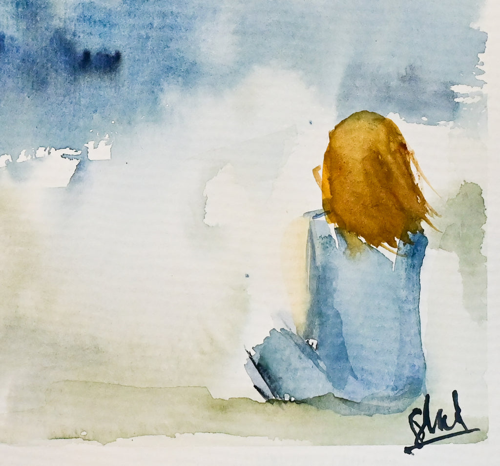 Young woman staring at the horizon